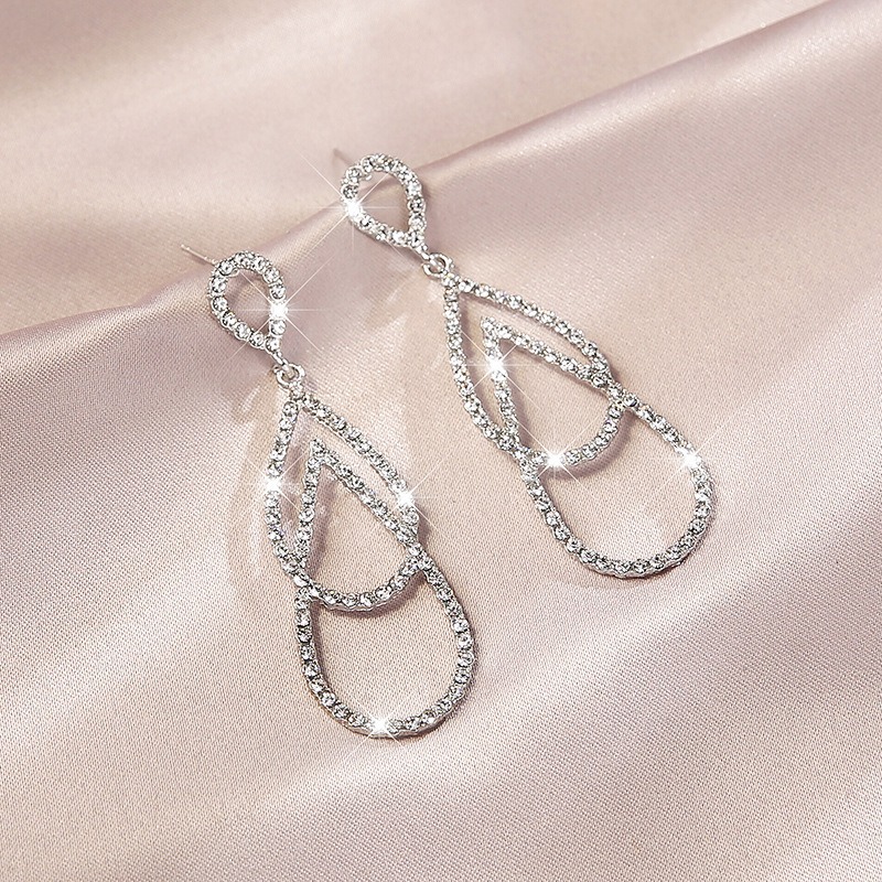 Aretes colgantes con circonitas