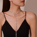 Juego de collar con aretes largos