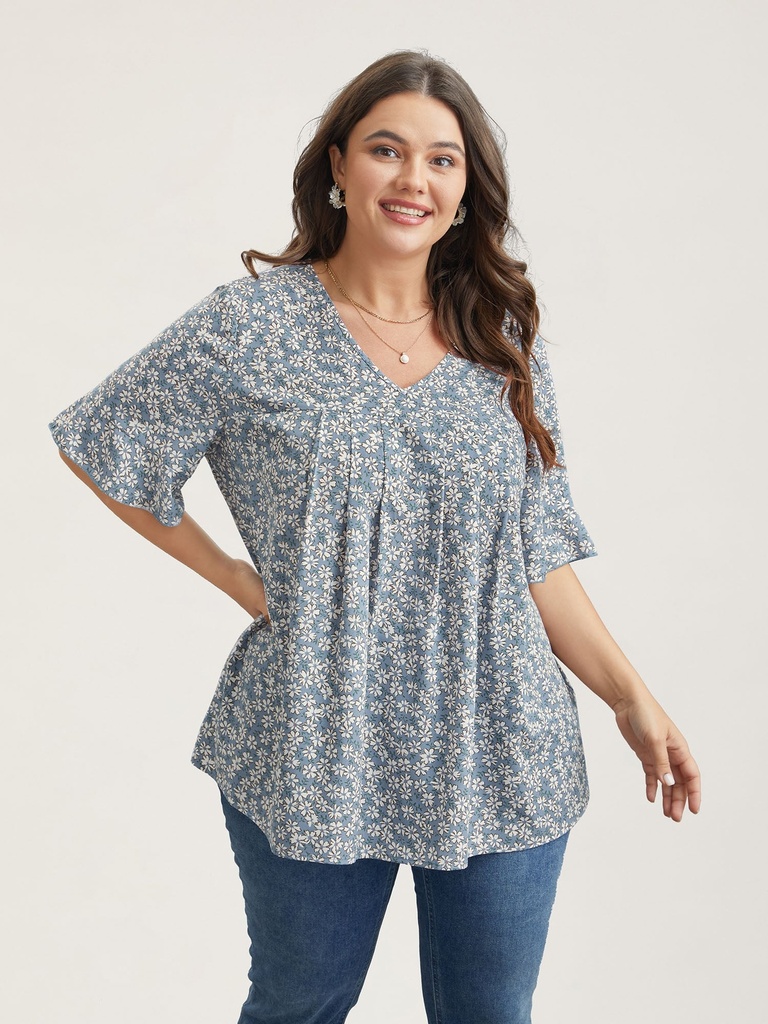 Blusa floral con mangas acampanadas