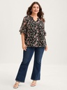 Blusa floral con mangas de volantes
