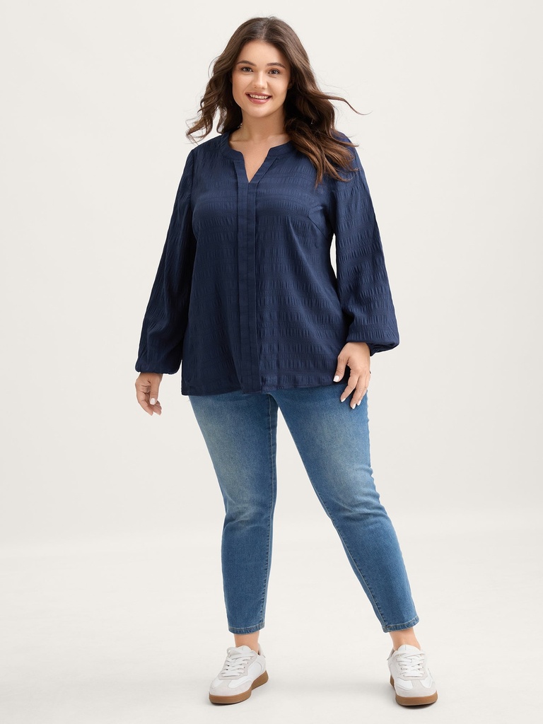 Blusa texturizada con mangas largas