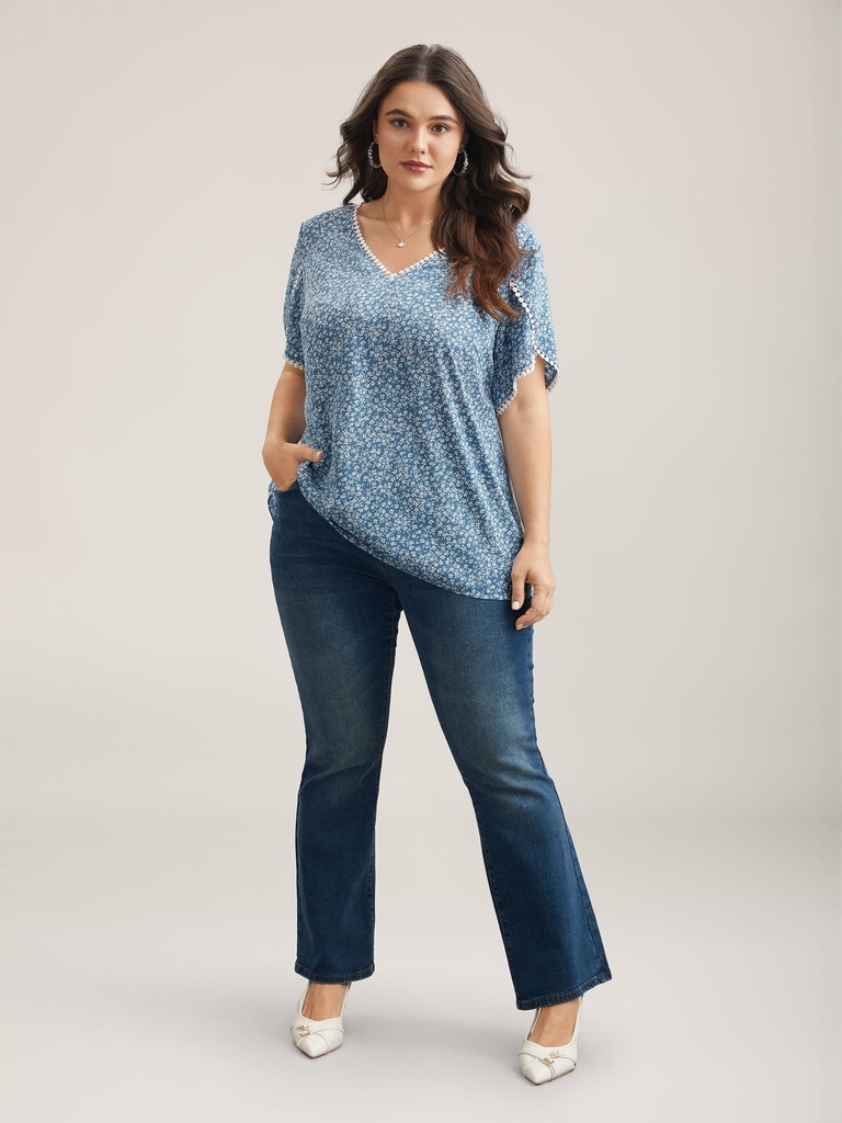 Blusa floral de mangas de pétalos