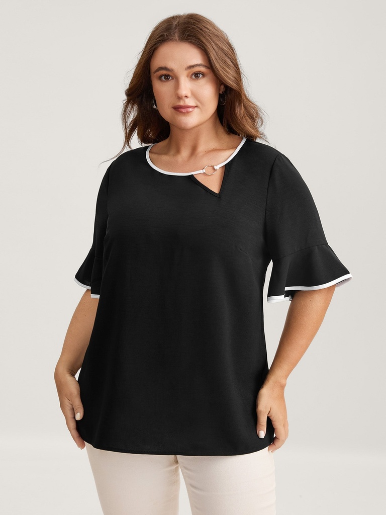 Blusa floral con manga en capas