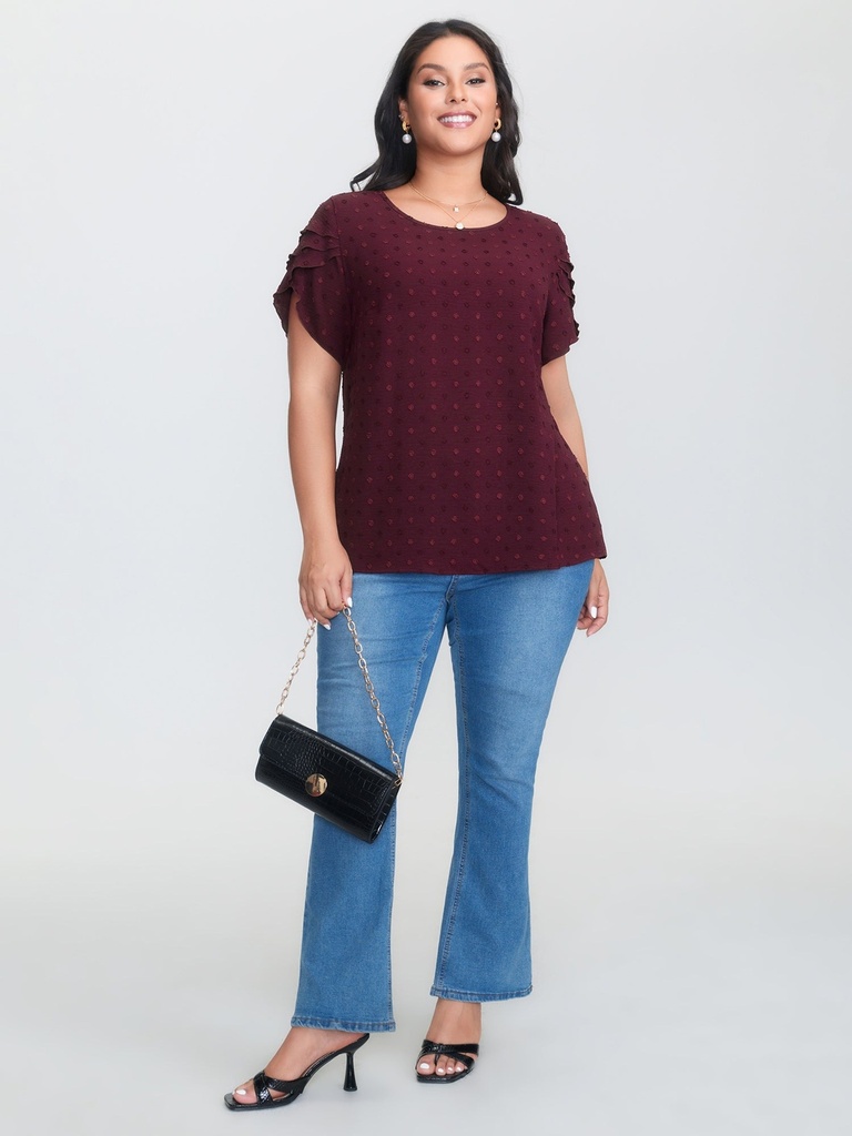 Blusa polka con volantes escalonados