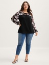 Blusa con mangas de gasa floral