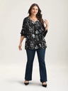 Blusa floral con mangas cortas en capas