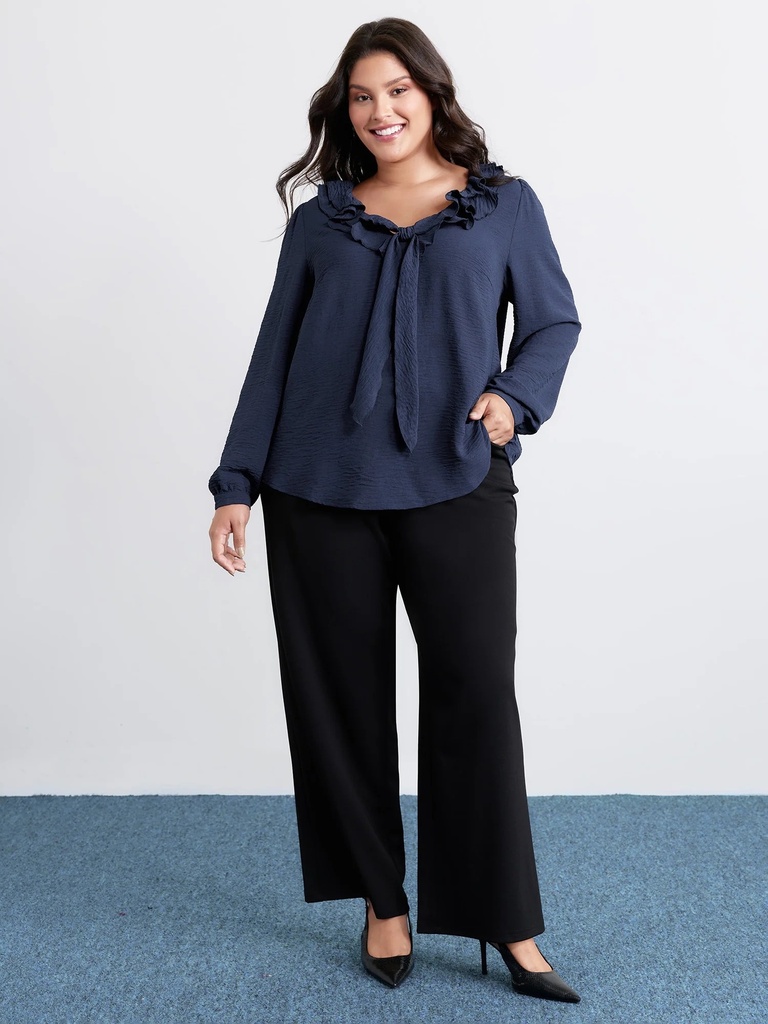 Blusa con volantes en el escote