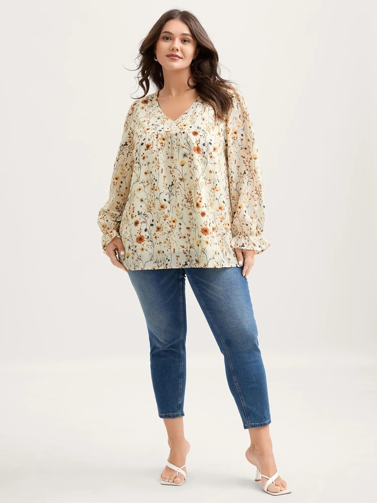 Blusa floral de mangas largas