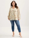 Blusa floral de mangas largas