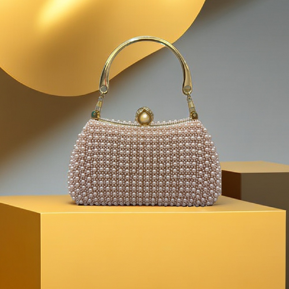 Bolso con asa de perlas