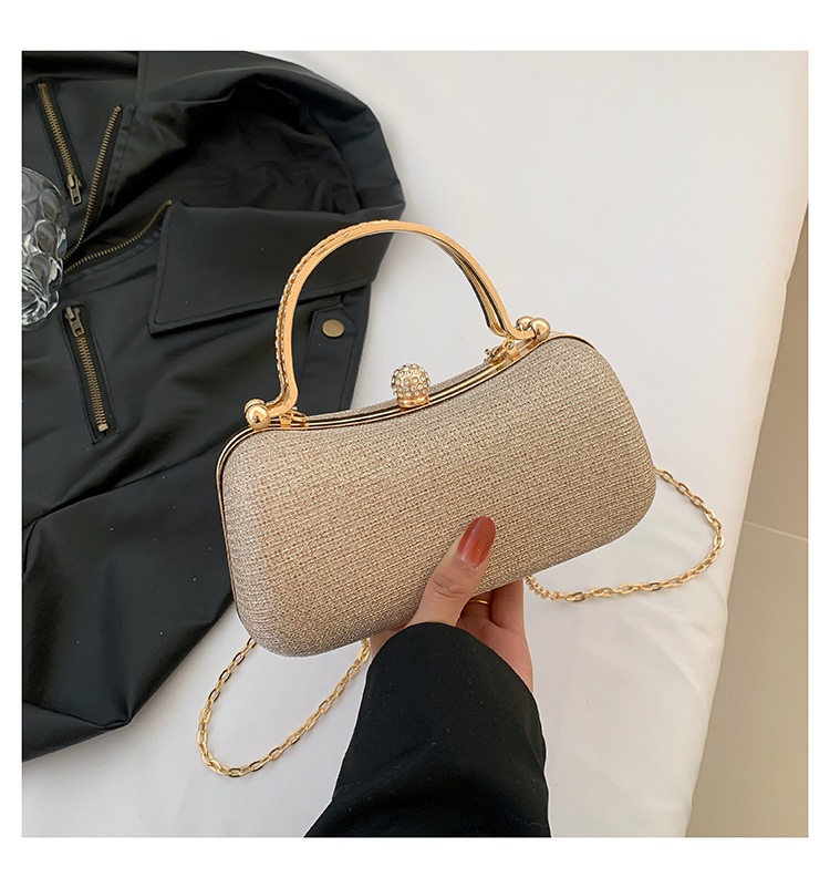 Bolso brillante de fiesta con broche