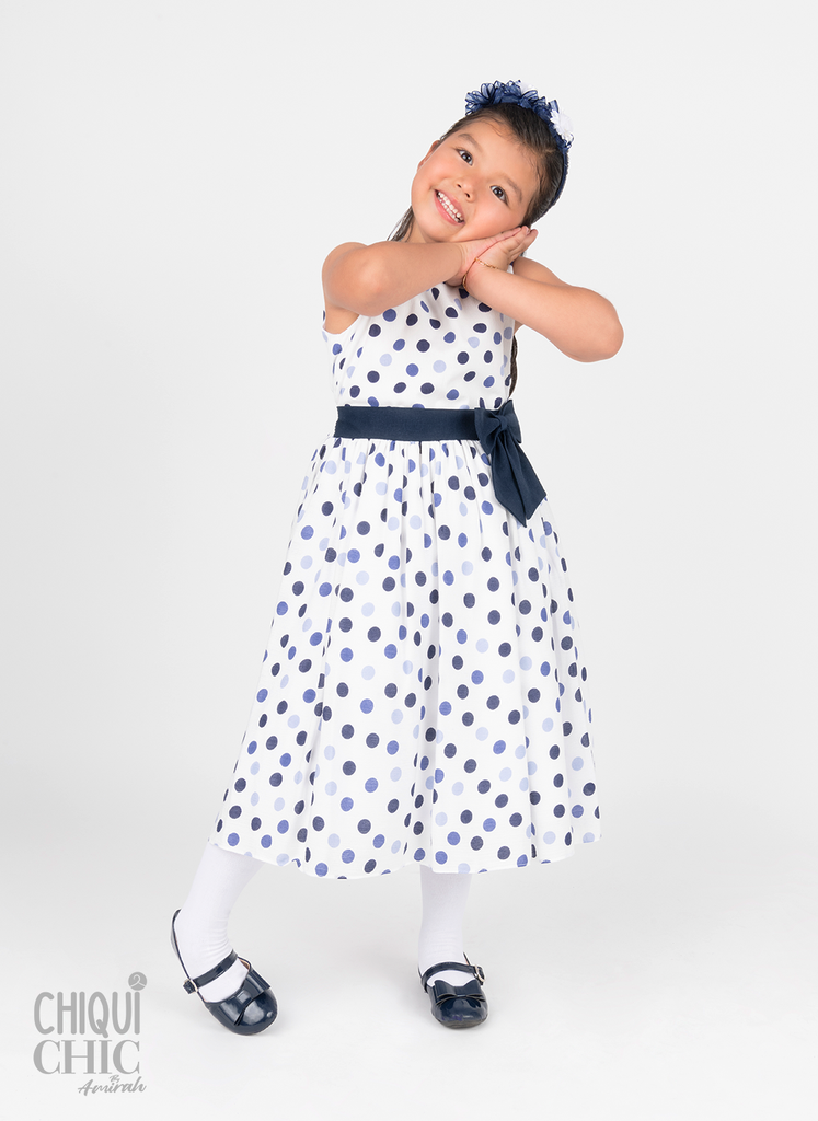 Vestido con estampado de puntos con moño al frente