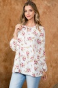Blusa floral con cordones en escote