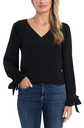 Blusa de crepe con mangas anudadas