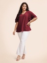 Blusa de lunares con escote en V