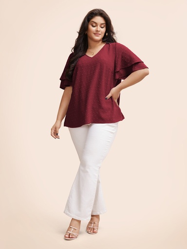 Blusa de lunares con escote en V