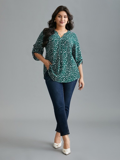 Blusa floral con mangas abotonadas