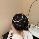 Bolso de mano redondo con diamantes