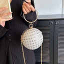 Bolso de mano redondo con diamantes
