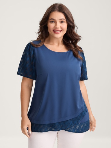 Blusa con dobladillo superpuesto