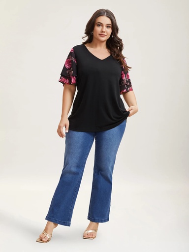 Blusa con mangas de flor de loto