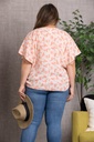 Blusa con aberturas y estampado floral