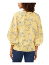 Blusa floral con mangas abullonadas