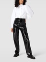Blusa con ribete de volantes
