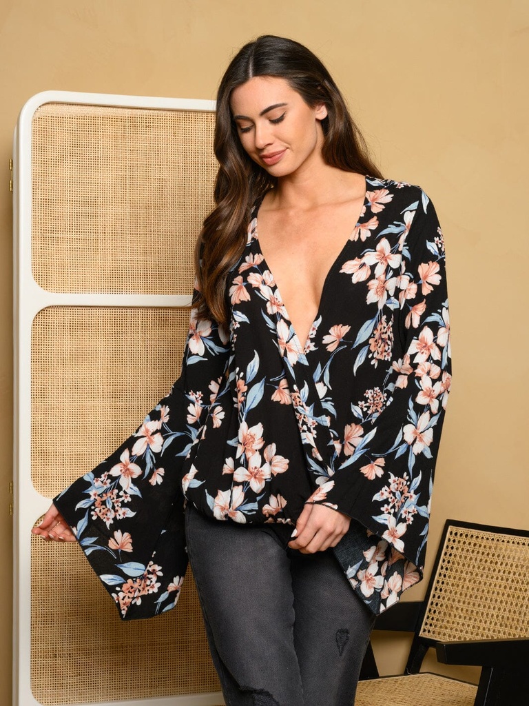 Blusa floral de mangas acampanadas 
