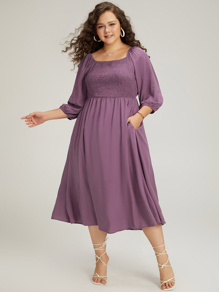 Vestido midi de corpiño fruncido