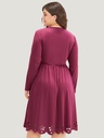 Vestido con aberturas florales
