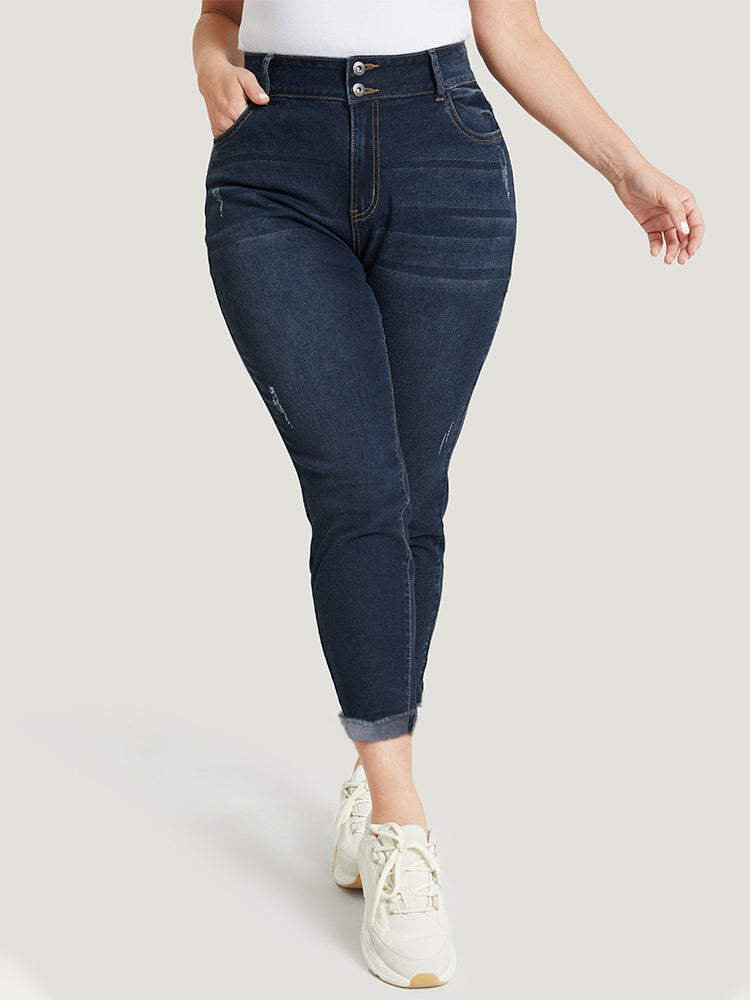 Jeans elásticos con detalle desgastado
