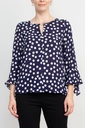 Blusa de puntos con ojo de cerradura