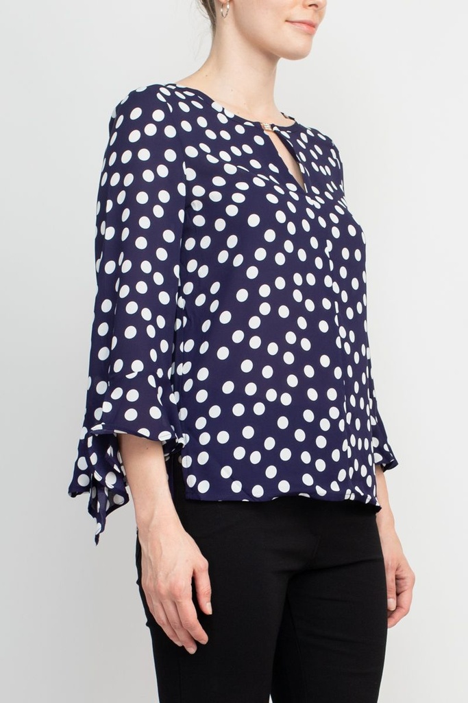 Blusa de puntos con ojo de cerradura
