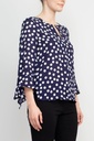 Blusa de puntos con ojo de cerradura
