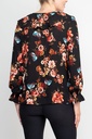 Blusa floral con volantes en el escote 