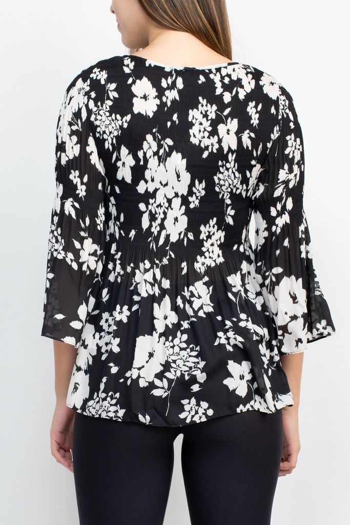 Blusa floral de puños acampanados 