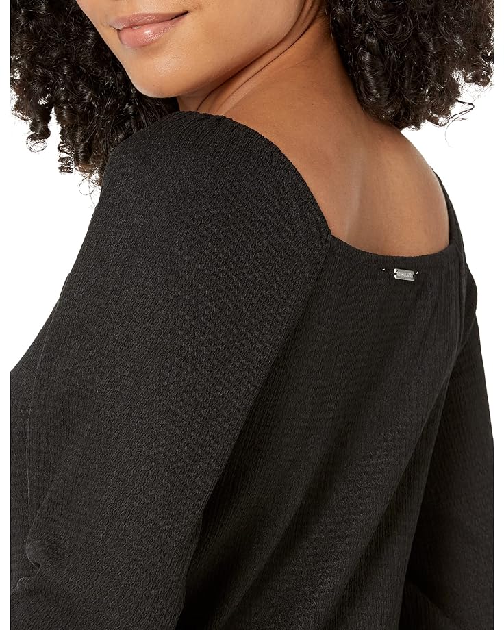 Blusa con escote fruncido