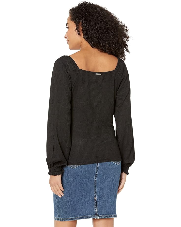 Blusa con escote fruncido