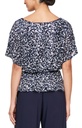 Blusa de noche con manga dolmán