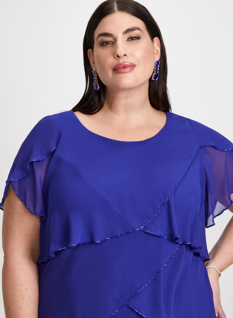 Vestido a capas con volantes y pedrería