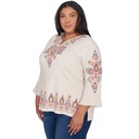 Blusa con mangas abullonadas y bordado 