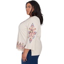 Blusa con mangas abullonadas y bordado 
