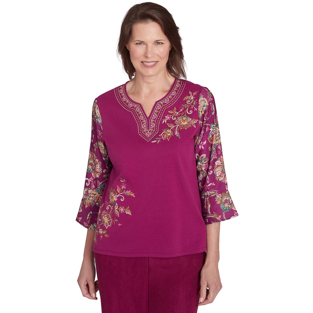 Blusa con mangas abullonadas y bordado 