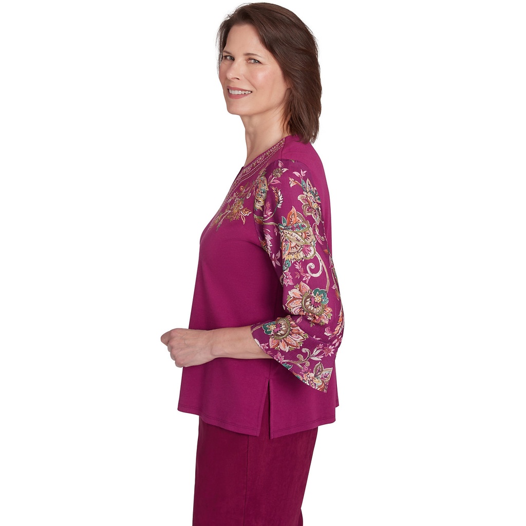Blusa con mangas abullonadas y bordado 