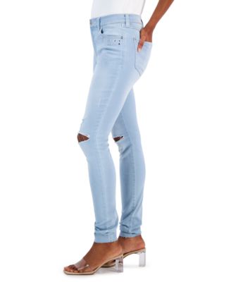 Jeans con bolsillos con tachuelas