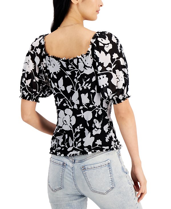 Blusa con mangas abullonadas