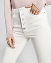 Jeans skinny con dadillo sin rematar