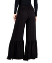 Pantalones con dobladillo escalonado