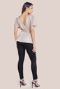 Blusa de lentejuelas traslapada